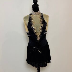 Elegant Black and Gold Women's ice-skating costume